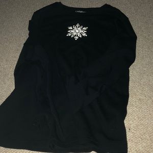 Black long sleeve with an white snowflake